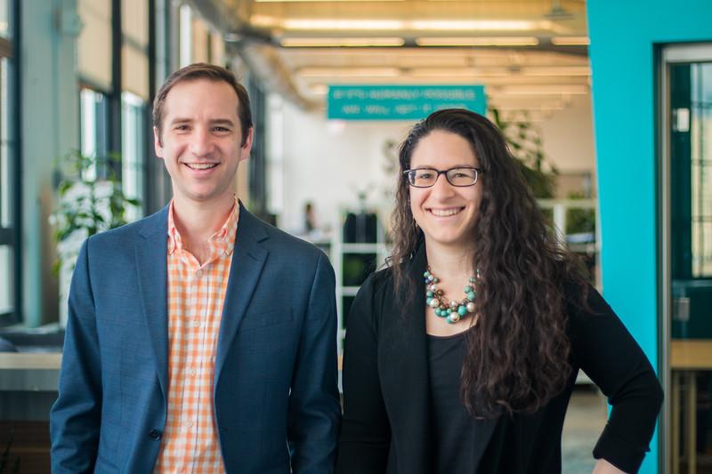 Chris Lucas and Sam Tackeff, the two Ompractice founders, standing side by side and smiling