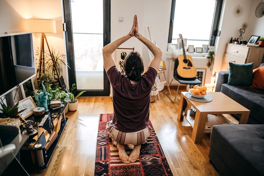 A person sitting in Hero's Pose