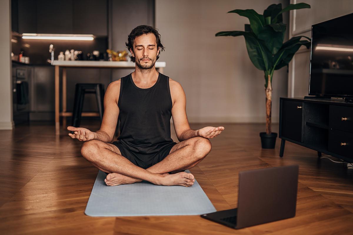 A person meditating in Easy Pose