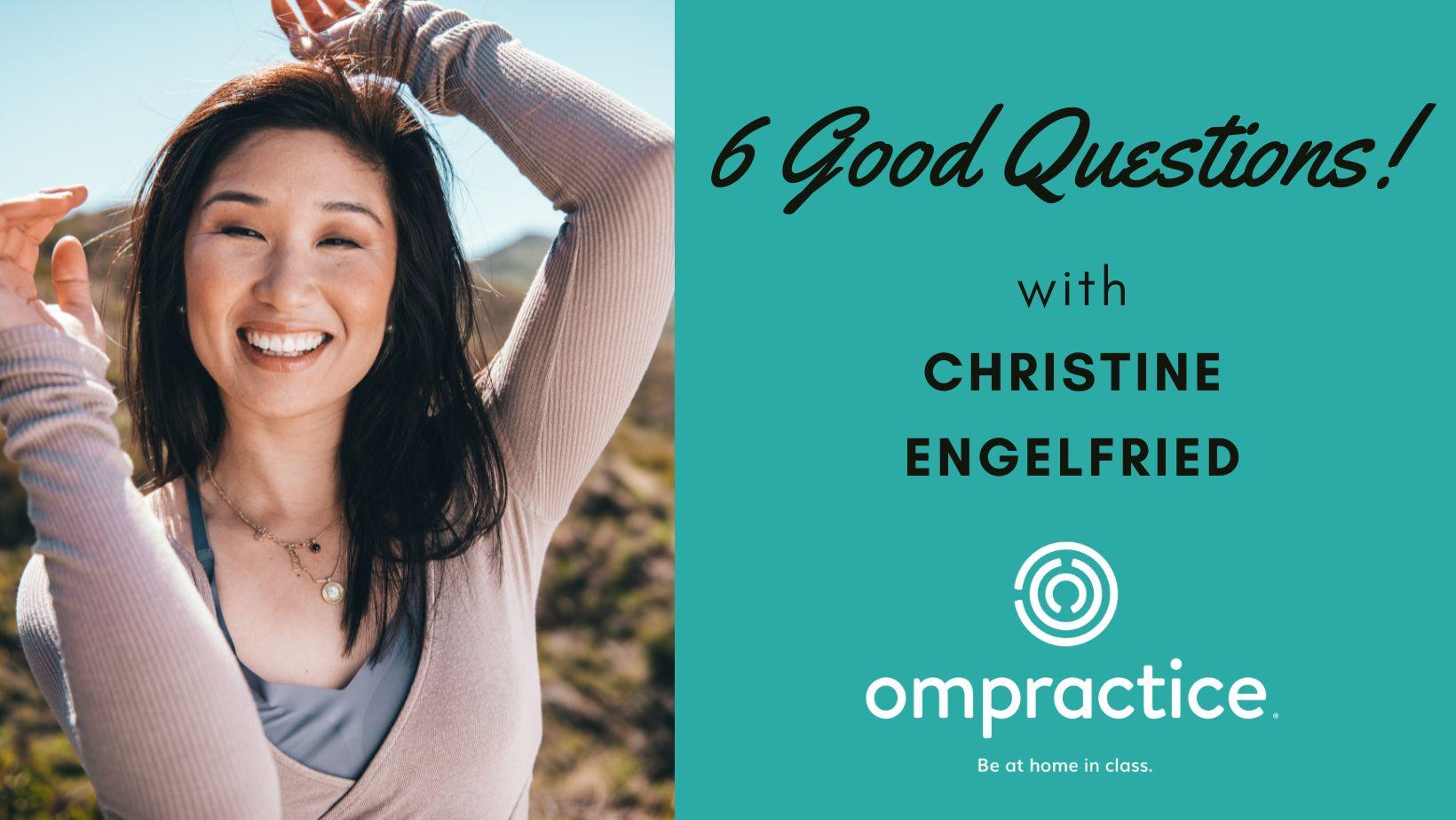 Ompractice teacher Christine Engelgried in pink sweater with arms overhead with teal Ompractice banner