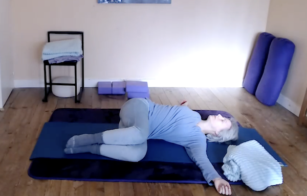 Ompractice teacher Beth Ciesco head shot with green art in background