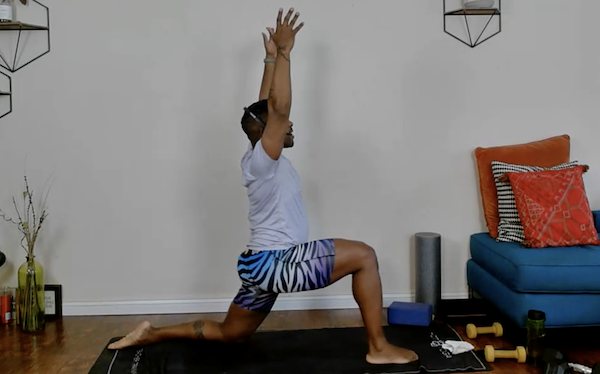 Ompractice teacher Cornelius Jones, Jr. demonstrating a lunge