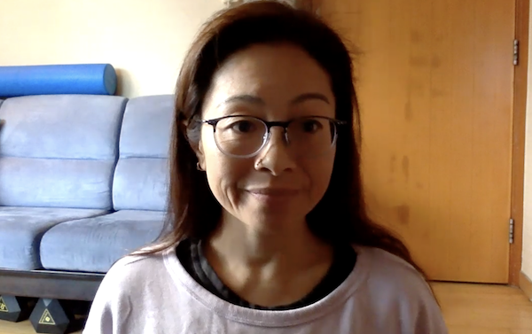 Ompractice teacher Tryphena Chia headshot looking upward