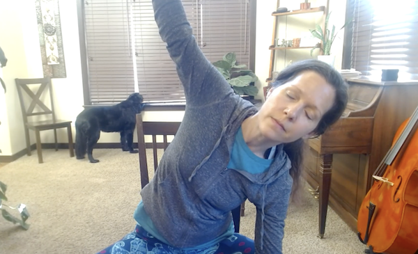 Ompractice teacher Marie Scicchitano head shot in purple shirt with white background