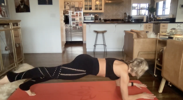 Ompractice teacher Elise Joan doing a plank