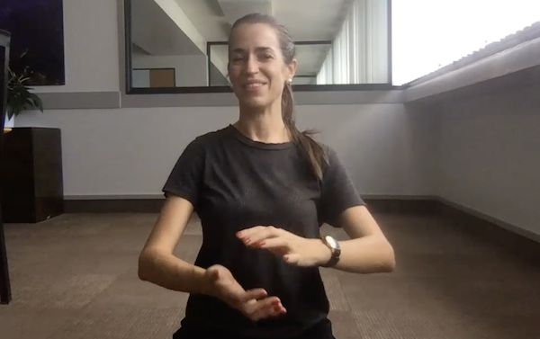 Ann Swanson demonstrating tai chi arm moves