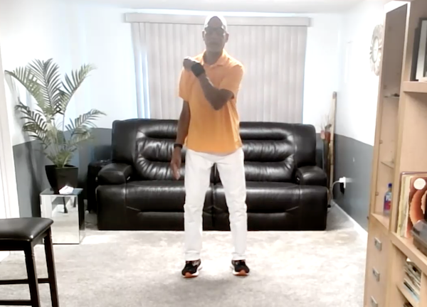 Ompractice teacher Sharif Zyhier smiling with sky background