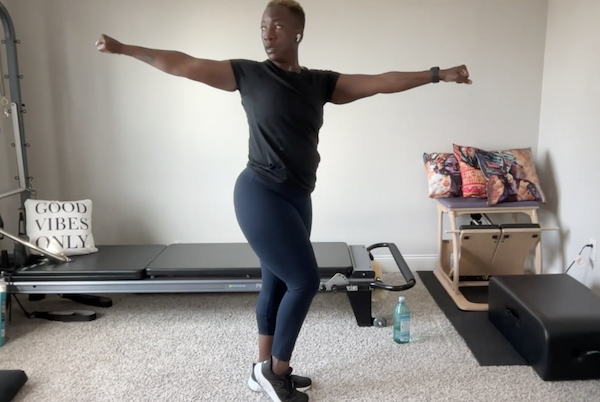 Ompractice teacher Tasha Edwards heashot with dark background