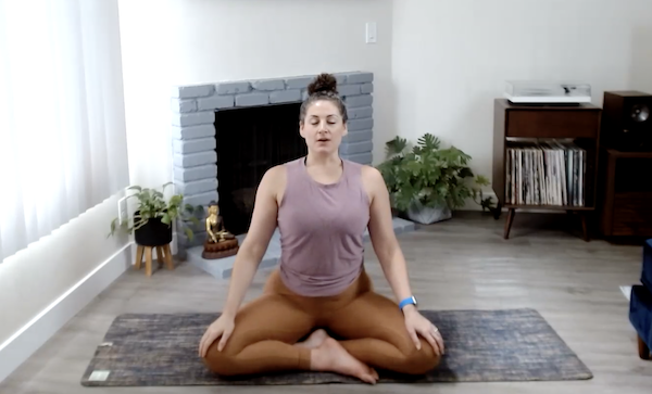 Ompractice teacher Niki Saccareccia seated