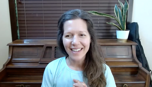 Ompractice teacher Marie seated