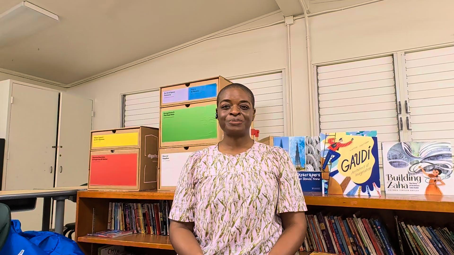 Ompractice teacher Alynthia penn in her classroom