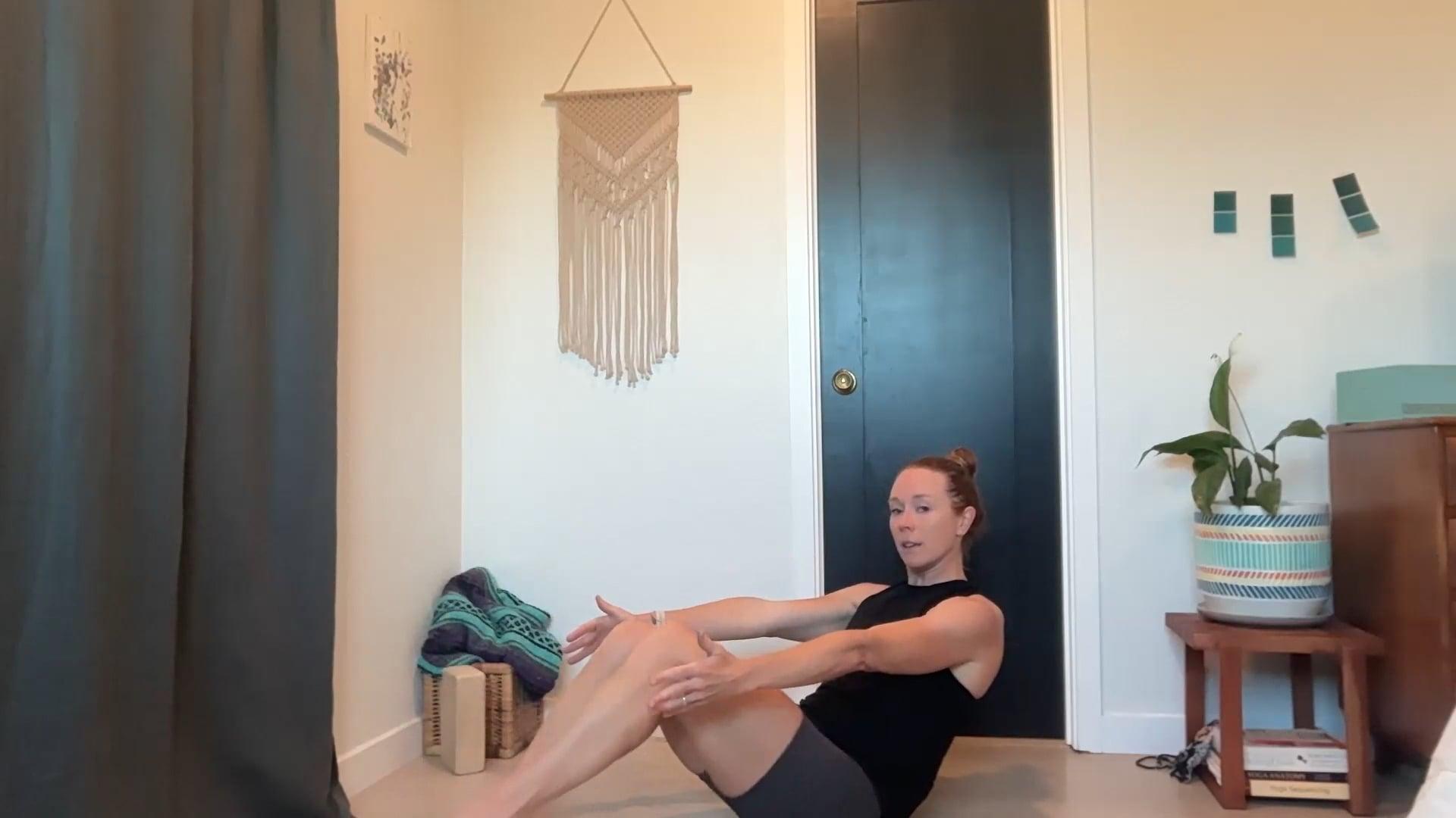 Ompractice teacher Val Minos in Boat Pose