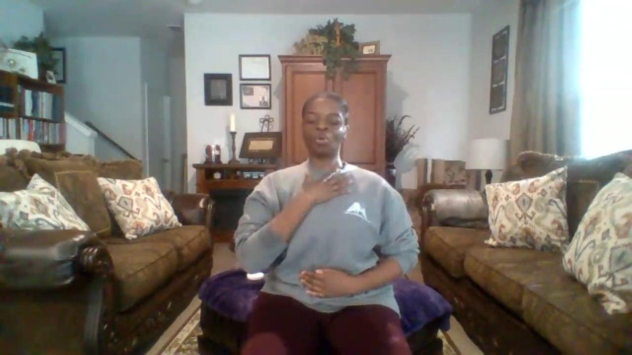 Ompractice teacher Alynthia Penn seated