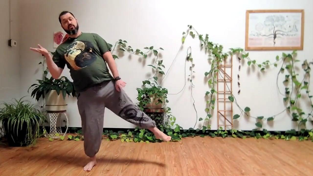Ompractice teacher Chris Moore balancing