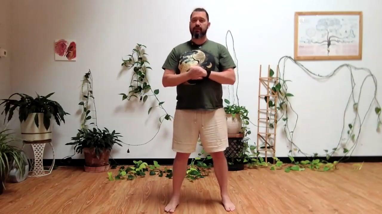 Ompractice teacher Chris Moore standing