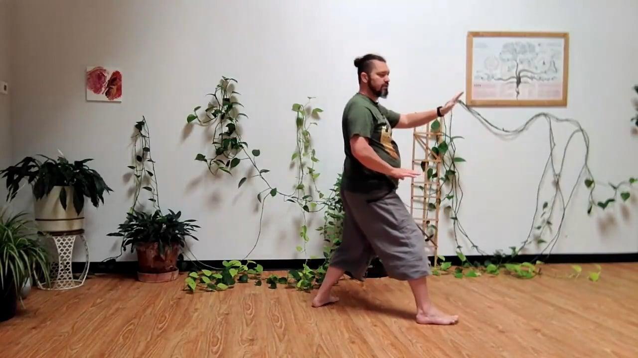 Ompractice teacher Chris Moore standing