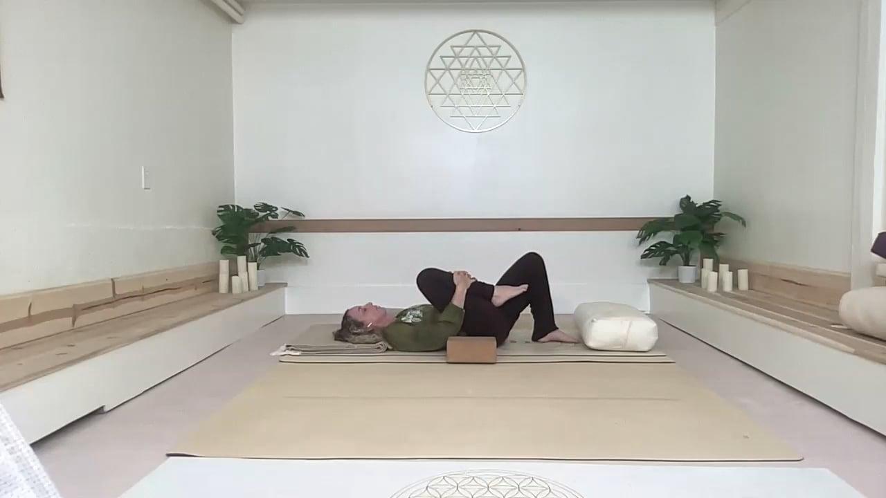 Ompractice teacher Prema lying on her back