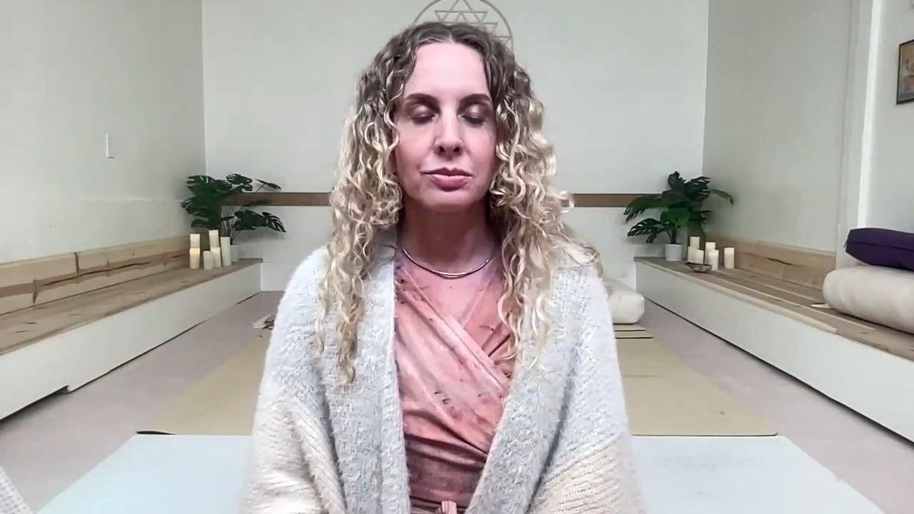 Ompractice teacher Prema Posner seated meditating