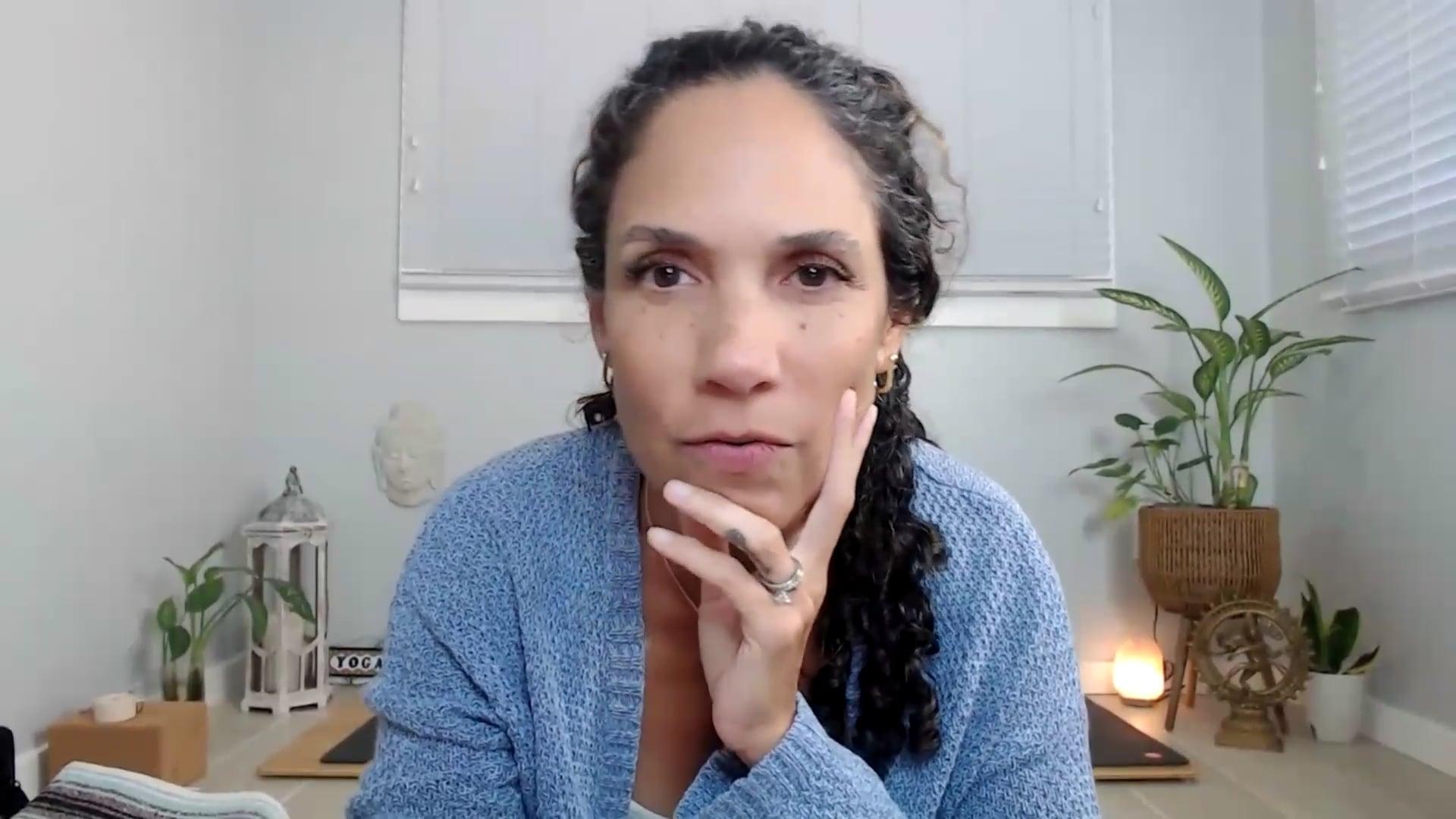 Ompractice teacher Yely Rivas sitting at her desk teaching