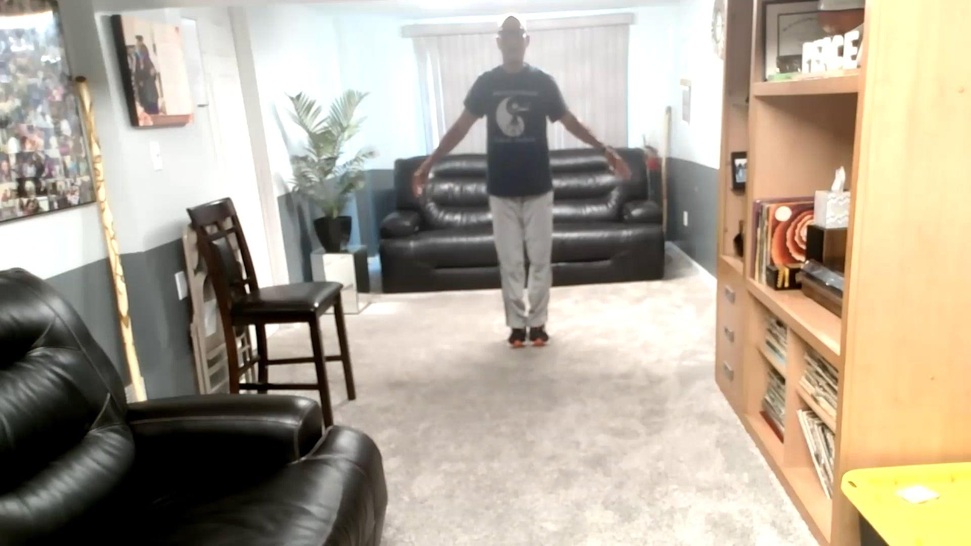 Ompractice Teacher Sharif Zyhier standing in tai chi pose