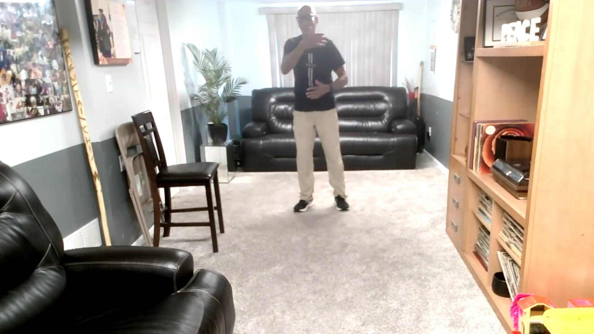 Ompractice Teacher Sharif Zyhier standing in tai chi pose