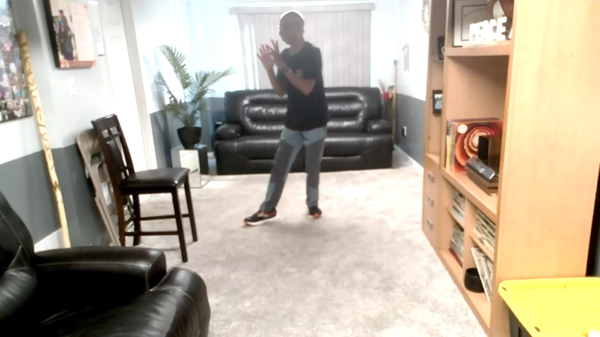 Ompractice Teacher Sharif Zyhier standing in tai chi pose