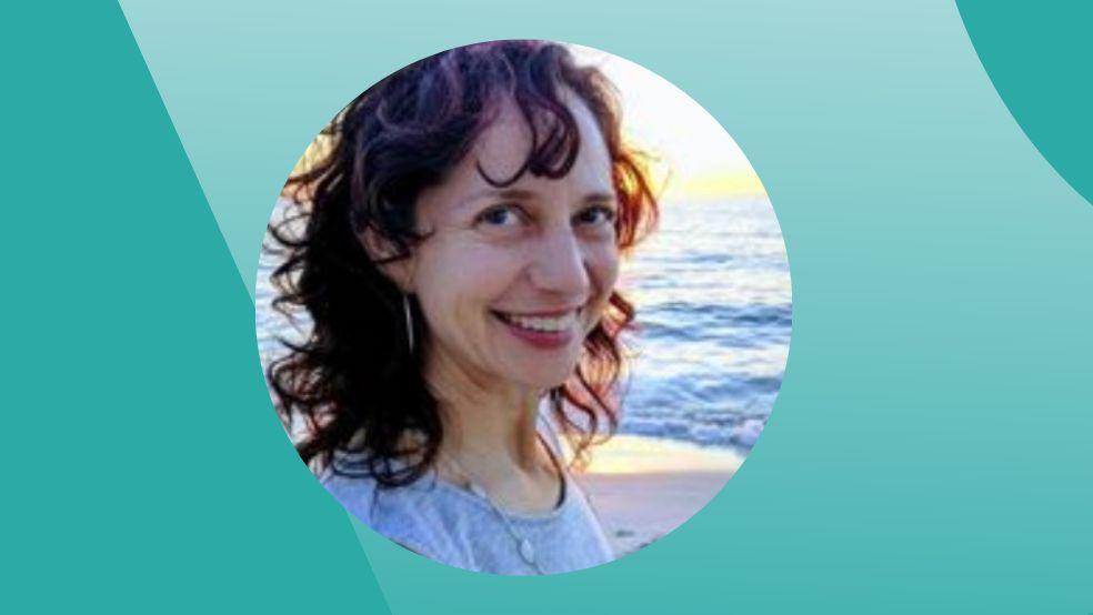 Ompractice teacher Emily Wiadro headshot on the beach