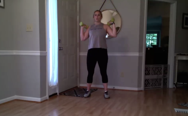 Ompractice Teacher Caitlin Culver with light weights standing